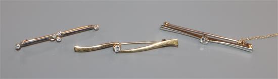 Three assorted diamond set bar brooches, including 15ct and 18ct gold, largest 56mm.